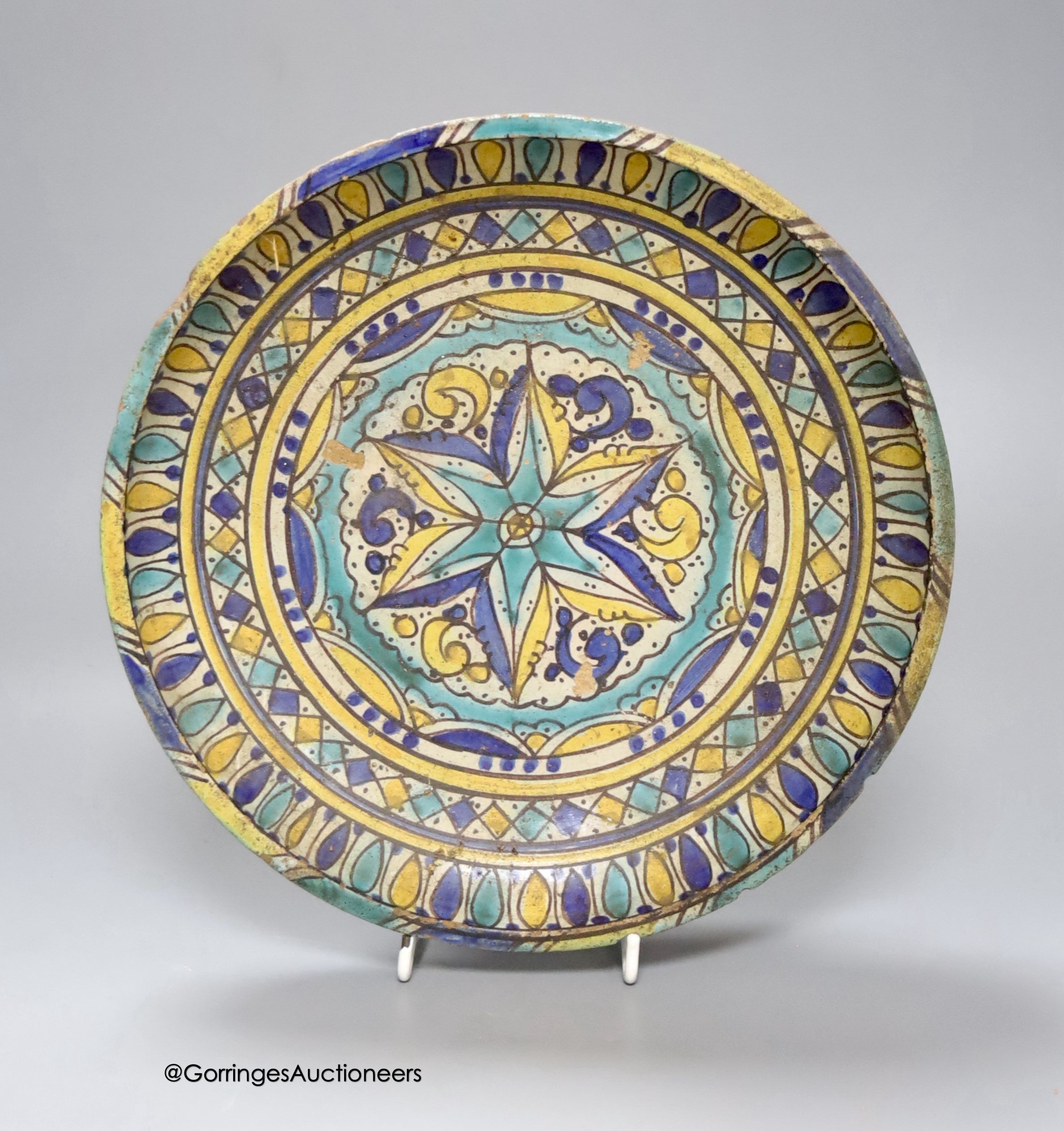 A Moroccan pottery dish, diameter 26cm